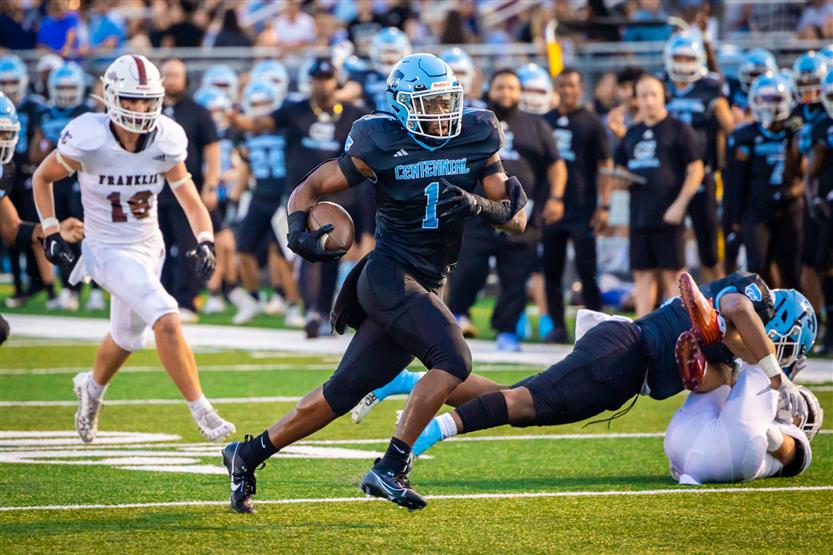 Student-athletes play football